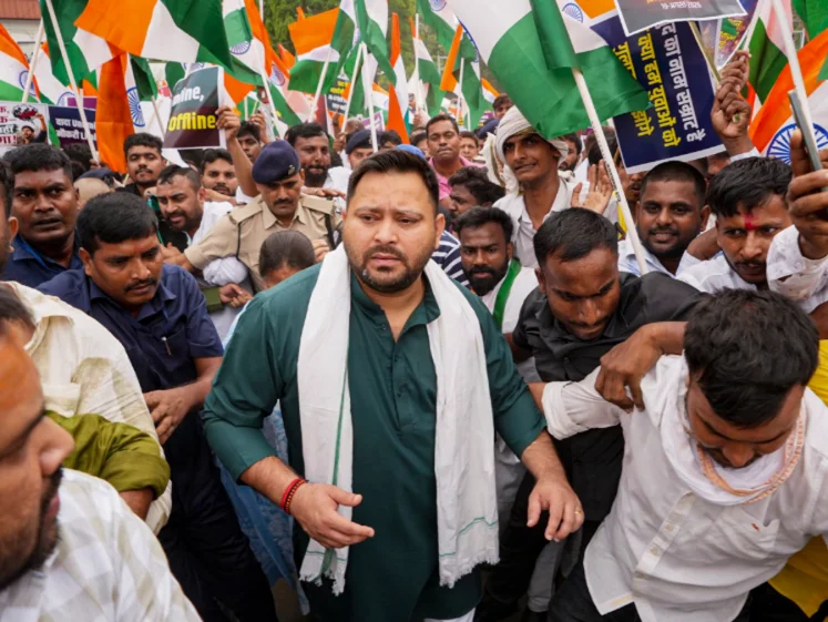 Tejashwi detained while protesting over Police action during NEET protests